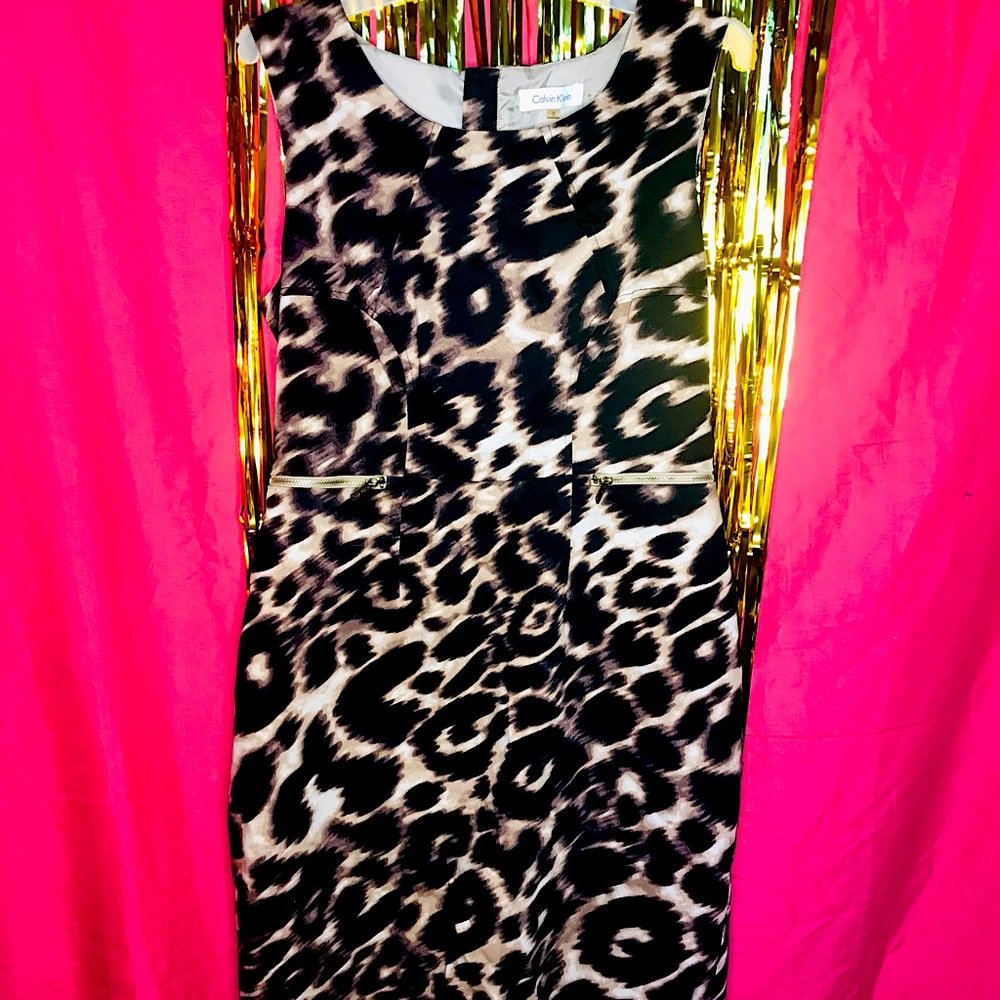 Selling size 8 Calvin Klein leopard print dress.
